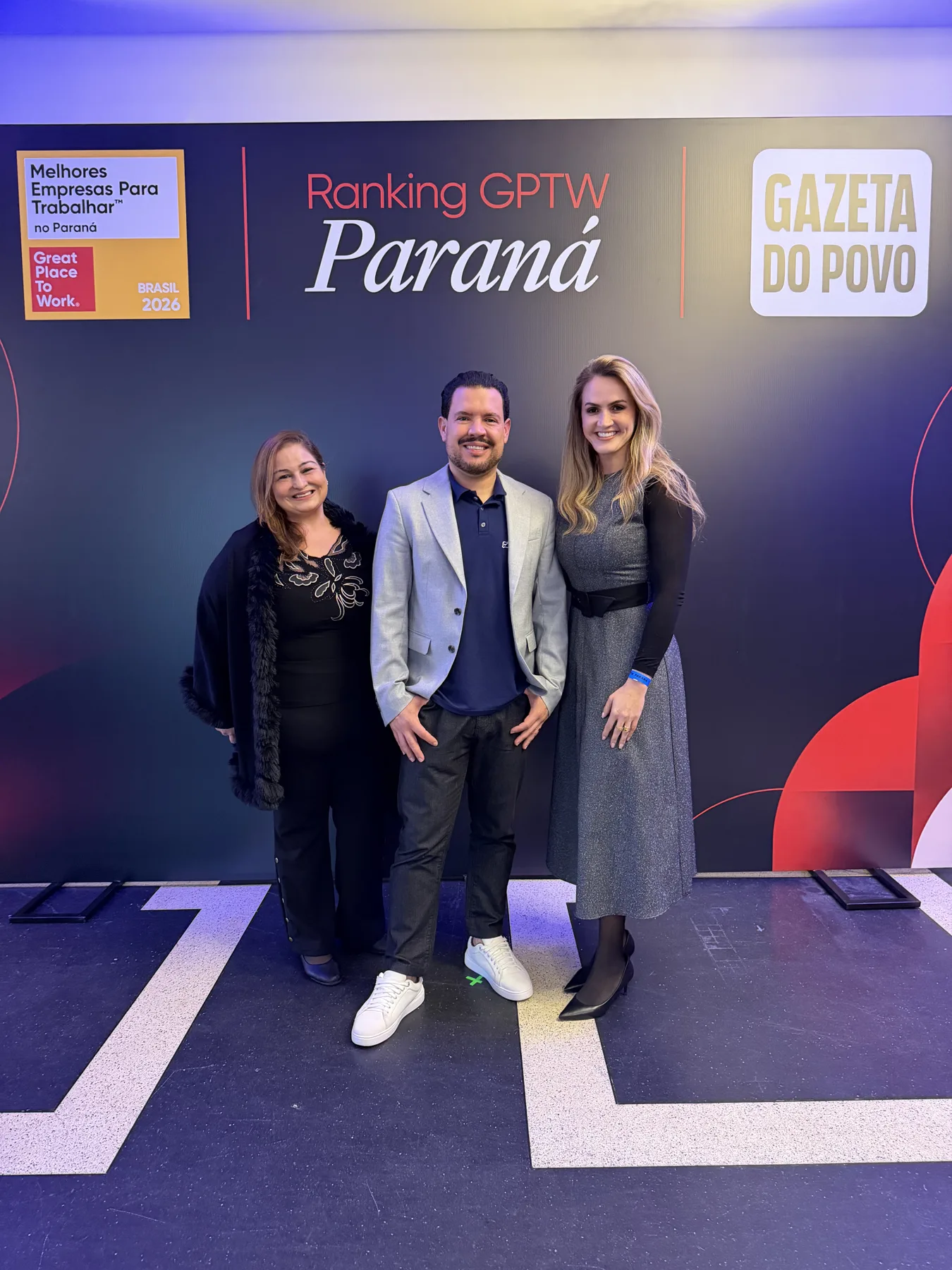 Everton Arantes e duas integrantes da Prime Control no painel do Ranking GPTW Paraná 2026